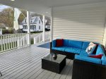 Relaxing main porch wraparound couch